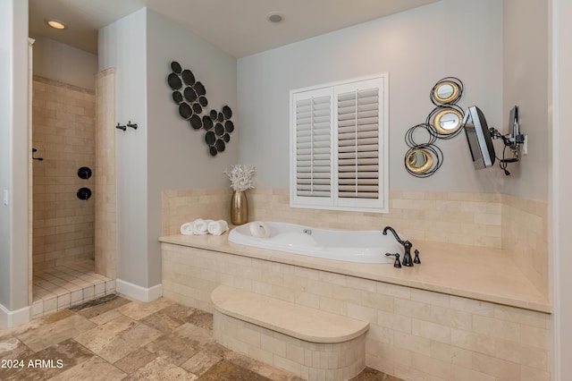 1409 E Dove Pl, Casa Grande, AZ 85122 - bathroom with a garden tub, tiled shower, baseboards, and recessed lighting