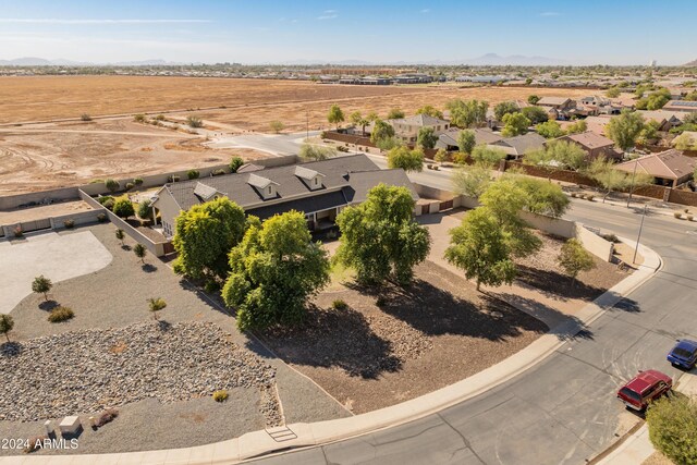1409 E Dove Pl, Casa Grande, AZ 85122 - aerial perspective of suburban area with a mountainous background