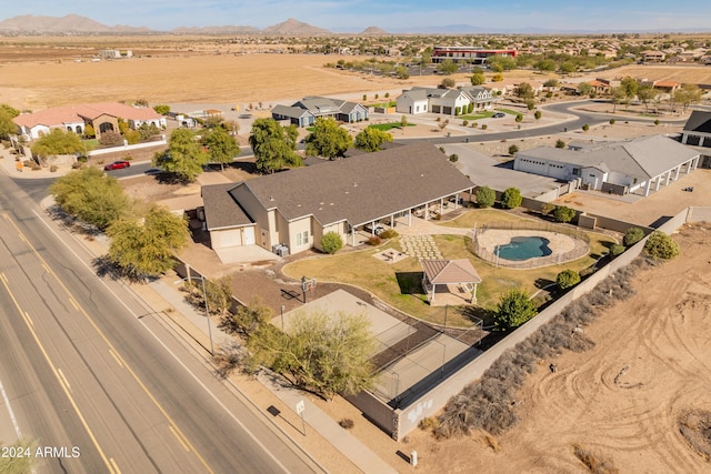 1409 E Dove Pl, Casa Grande, AZ 85122 - aerial perspective of suburban area with mountains and a pool area
