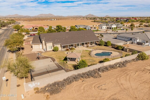1409 E Dove Pl, Casa Grande, AZ 85122 - aerial perspective of suburban area with a mountainous background and a pool