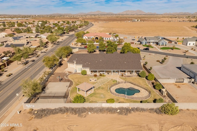 1409 E Dove Pl, Casa Grande, AZ 85122 - aerial view of residential area featuring a pool and mountains