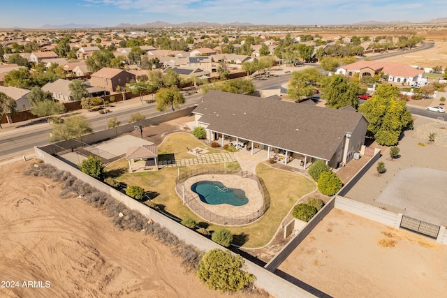 1409 E Dove Pl, Casa Grande, AZ 85122 - aerial view of residential area featuring a pool area and a mountain backdrop