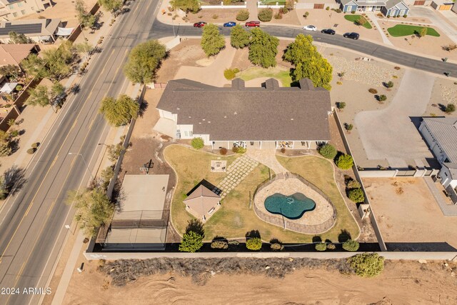 1409 E Dove Pl, Casa Grande, AZ 85122 - aerial view of property's location with a pool and nearby suburban area
