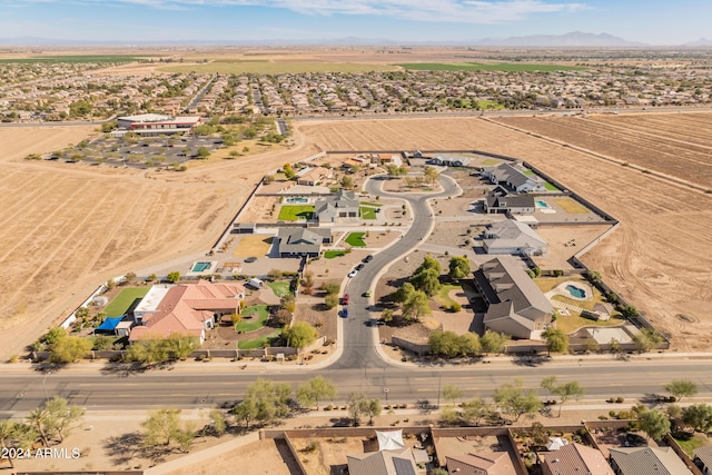 1409 E Dove Pl, Casa Grande, AZ 85122 - aerial view of property's location featuring mountains and nearby suburban area