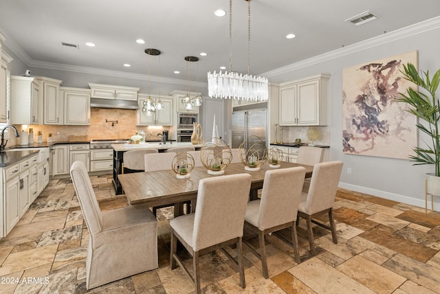 1409 E Dove Pl, Casa Grande, AZ 85122 - dining room with stone tile floors, ornamental molding, recessed lighting, and baseboards