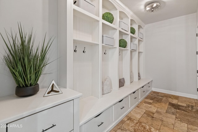 1409 E Dove Pl, Casa Grande, AZ 85122 - mudroom with stone tile flooring and baseboards