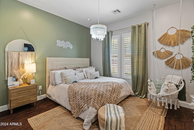 1409 E Dove Pl, Casa Grande, AZ 85122 - bedroom featuring a chandelier, dark wood-style floors, baseboards, and recessed lighting