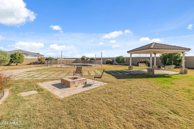 1409 E Dove Pl, Casa Grande, AZ 85122 - view of yard with a gazebo, a patio area, a fire pit, and a pool