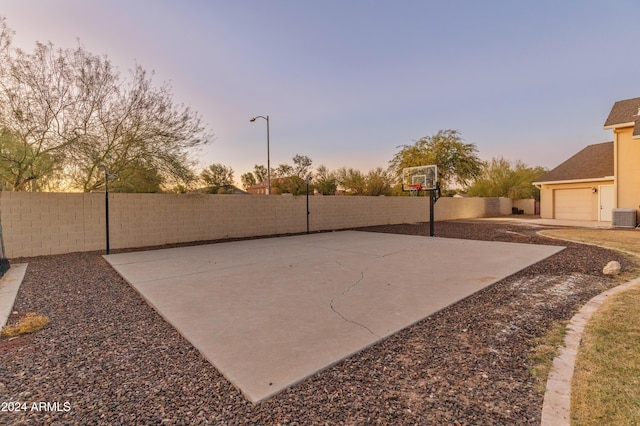 1409 E Dove Pl, Casa Grande, AZ 85122 - view of sport court featuring a fenced backyard and basketball hoop