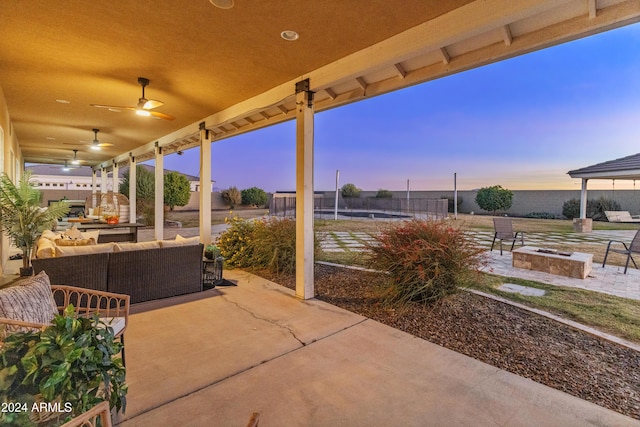 1409 E Dove Pl, Casa Grande, AZ 85122 - view of patio with an outdoor living space with a fire pit and ceiling fan