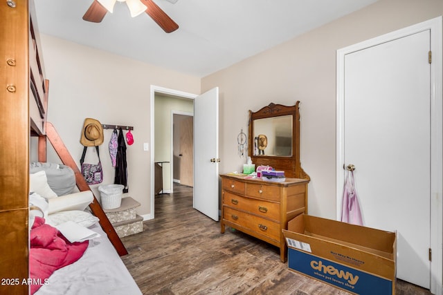 bedroom featuring ceiling fan and wood finished floors