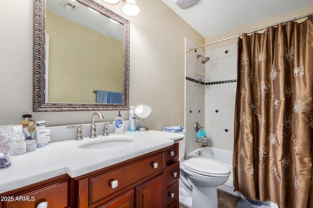 full bathroom featuring visible vents, toilet, vanity, and shower / bath combination with curtain