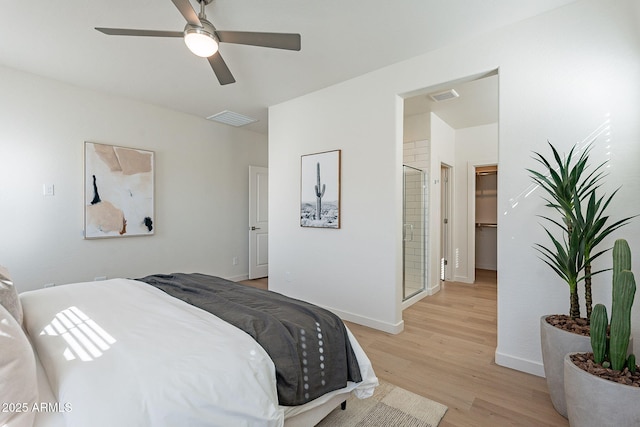 bedroom with visible vents, baseboards, ceiling fan, and light wood finished floors