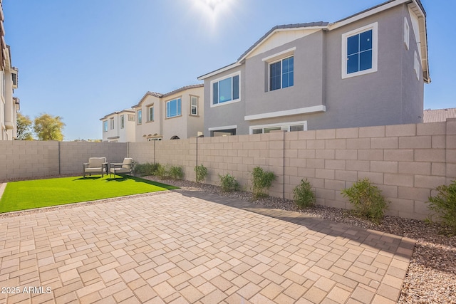 view of patio with a fenced backyard