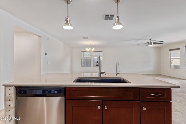 kitchen with a sink, visible vents, open floor plan, light countertops, and dishwasher