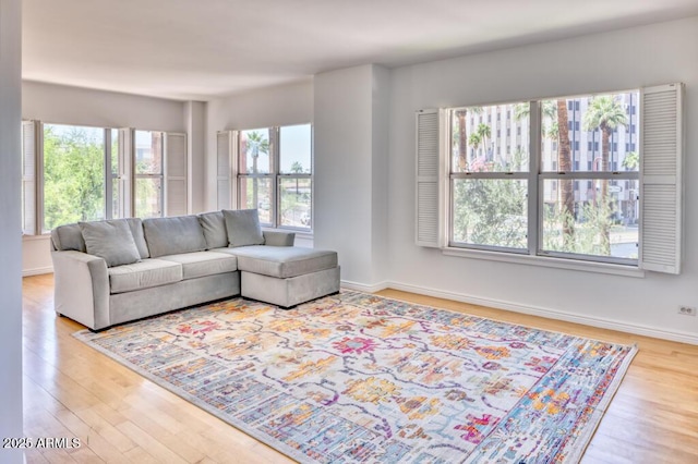 2201 N Central Ave Unit 3D, Phoenix, AZ 85004 - living room featuring wood finished floors and baseboards