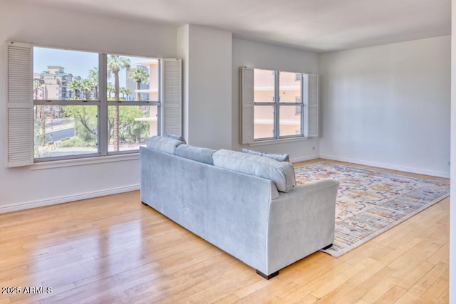 2201 N Central Ave Unit 3D, Phoenix, AZ 85004 - living room with wood finished floors and baseboards