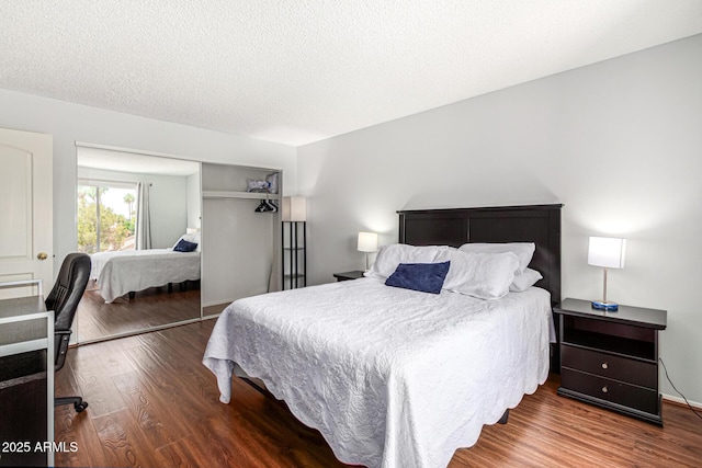 540 N May Unit 3117, Mesa, AZ 85201 - bedroom featuring wood finished floors, a closet, and a textured ceiling