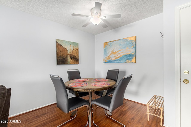 540 N May Unit 3117, Mesa, AZ 85201 - dining space with wood finished floors, ceiling fan, a textured ceiling, and baseboards