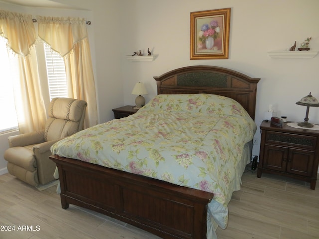 bedroom featuring light wood-type flooring