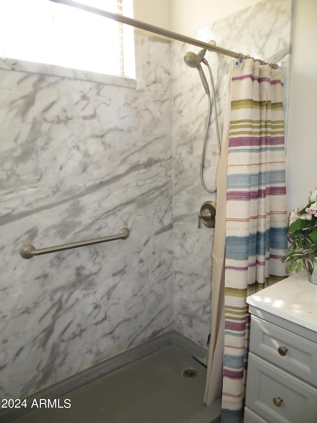 bathroom featuring a shower with curtain