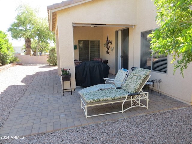 view of patio featuring a grill