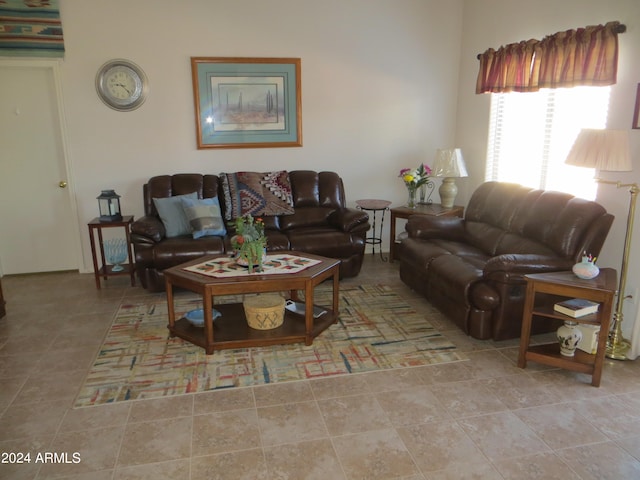 living room with tile patterned floors