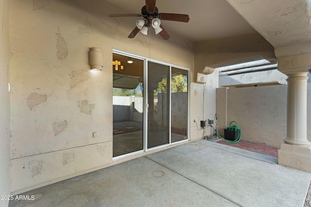 view of patio with a ceiling fan