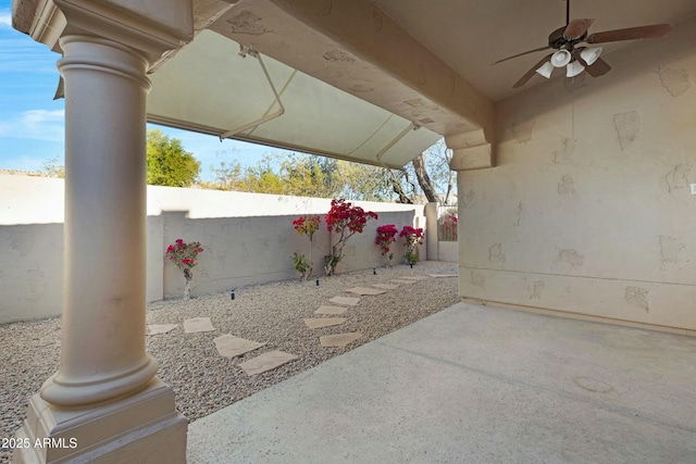 view of patio with a ceiling fan and a fenced backyard