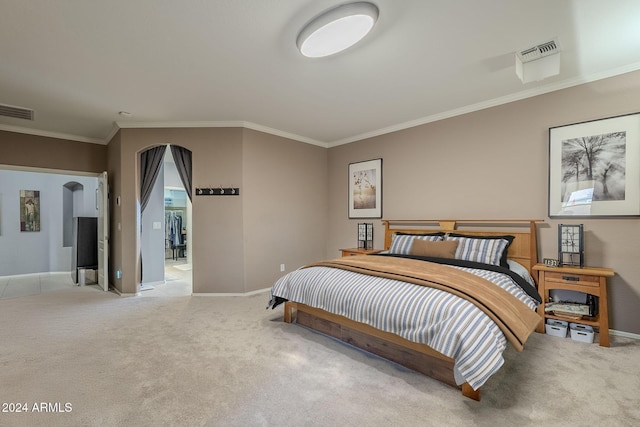 bedroom featuring light colored carpet and ornamental molding