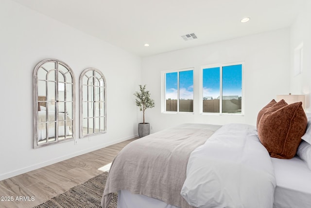 bedroom featuring light wood-type flooring