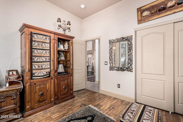 interior space with dark hardwood / wood-style flooring