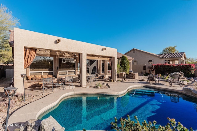 view of swimming pool with a patio