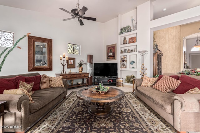 living room featuring ceiling fan