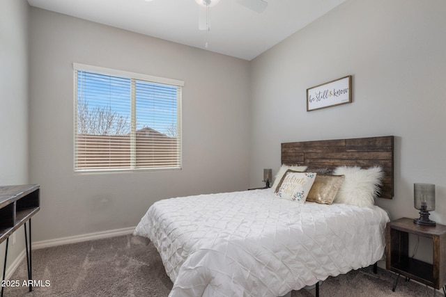 carpeted bedroom featuring baseboards and a ceiling fan