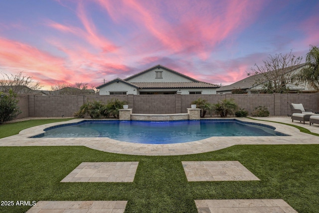 pool at dusk with a fenced backyard, a fenced in pool, a lawn, and a patio