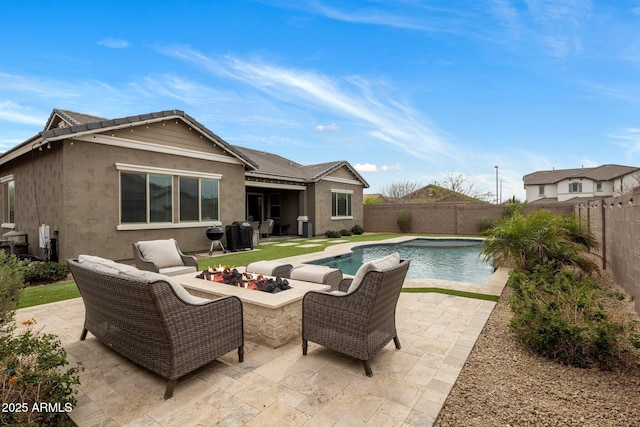 exterior space featuring a fenced backyard, outdoor lounge area, a fenced in pool, stucco siding, and a patio area