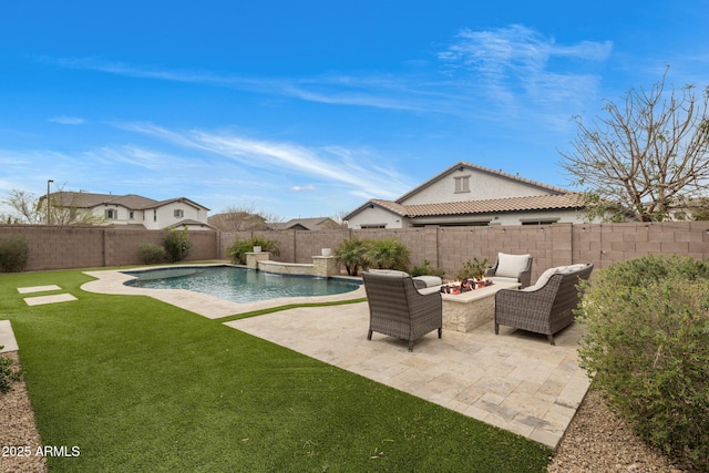 view of swimming pool with a fenced backyard, a lawn, a fenced in pool, a patio area, and an outdoor living space with a fire pit