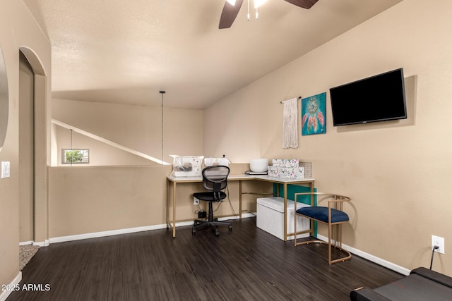 office space with baseboards, ceiling fan, and wood finished floors