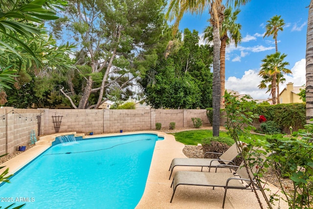 view of swimming pool featuring a fenced backyard and a fenced in pool