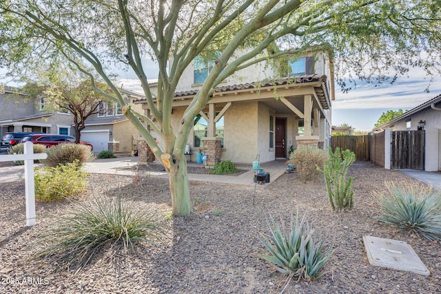 view of front of property featuring a garage