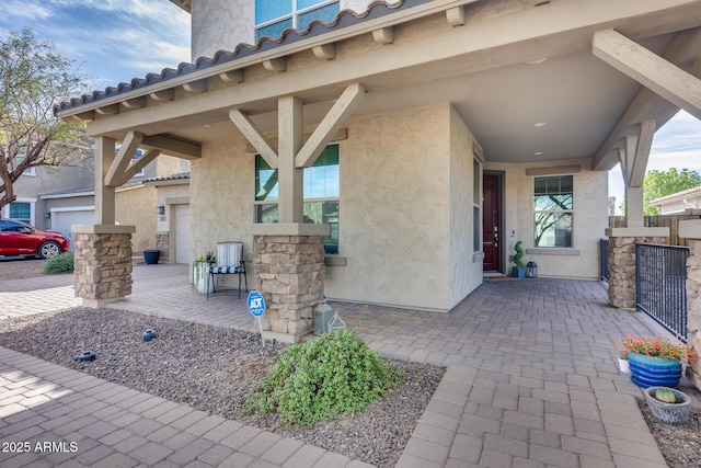 view of patio featuring a garage