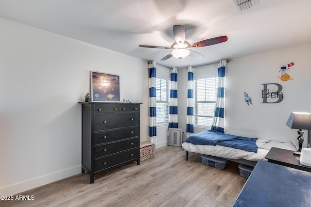 bedroom featuring ceiling fan and light wood-type flooring