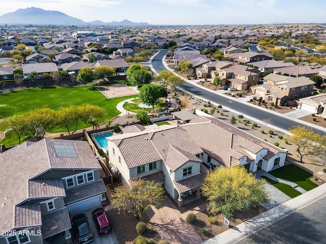 birds eye view of property featuring a mountain view