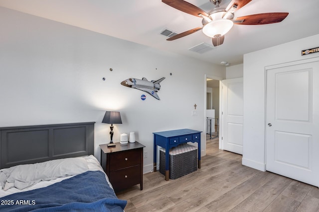 bedroom featuring ceiling fan and light hardwood / wood-style flooring