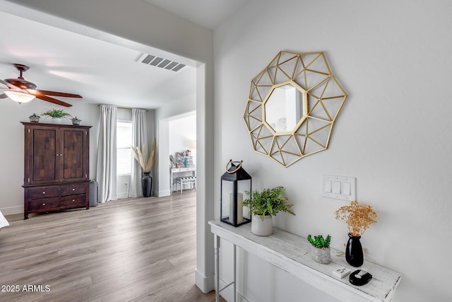 hall featuring light hardwood / wood-style flooring