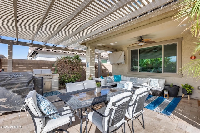 view of patio / terrace with a pergola, ceiling fan, a grill, an outdoor hangout area, and exterior kitchen