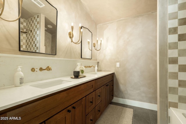 full bathroom featuring visible vents, double vanity, a shower, and a sink