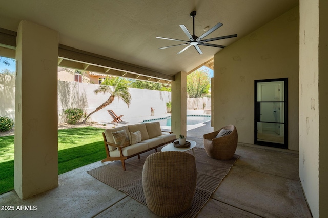 view of patio with a fenced in pool, an outdoor hangout area, ceiling fan, and a fenced backyard