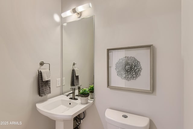 half bathroom with toilet